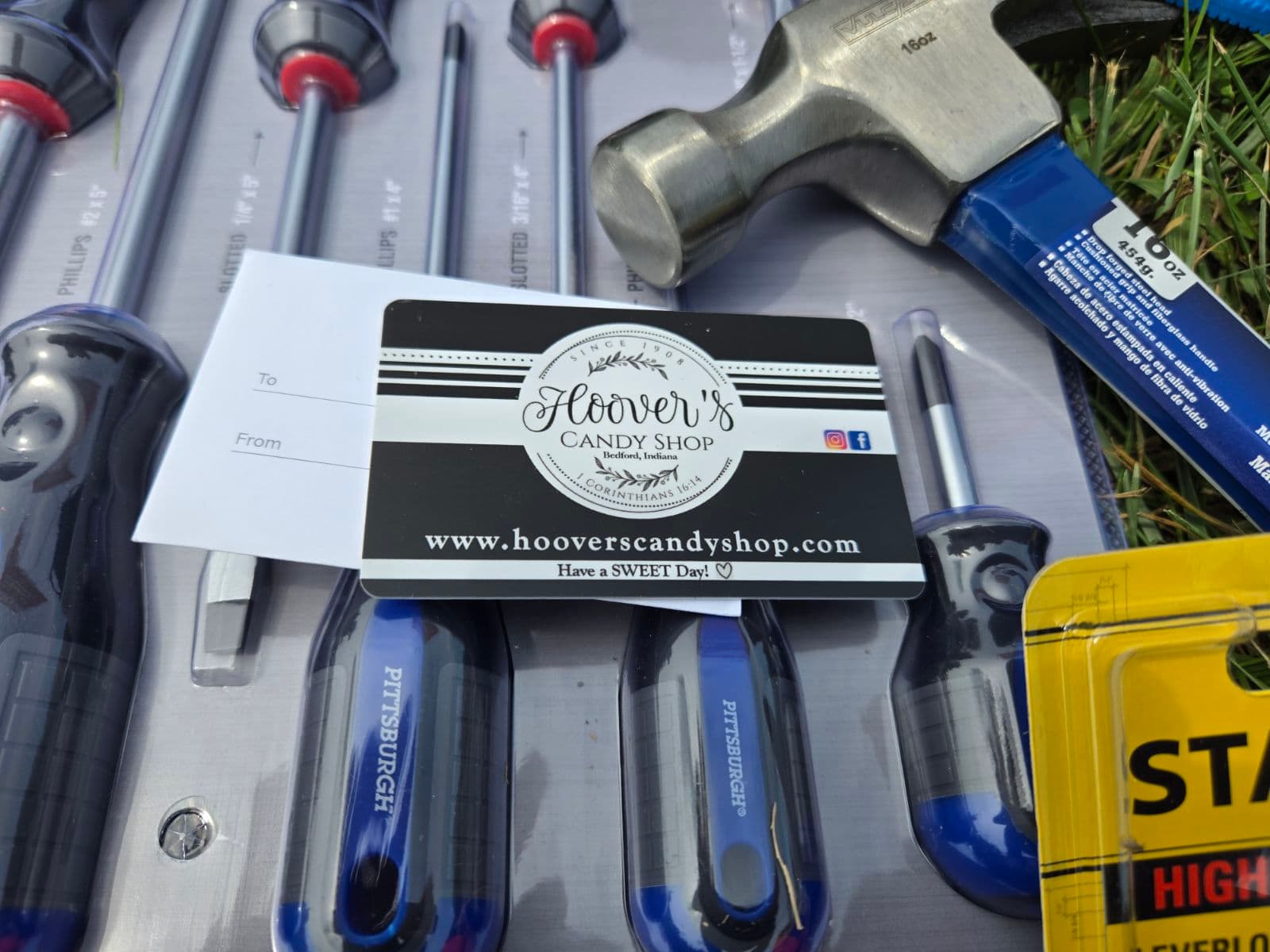 Gift card and tools from the Yard Sign Giveaway prize